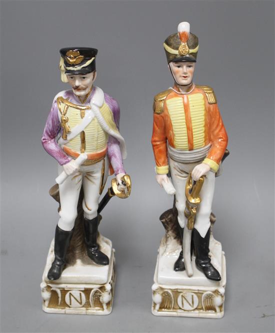 Two porcelain figures of Napoleonic soldiers, 32 and 34cm